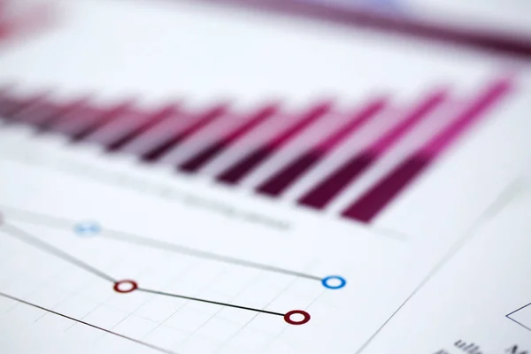 Financial statistics documents on clipboard pad at office table closeup — Stock Photo, Image