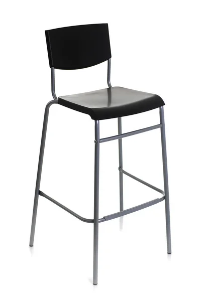 Barstool on high metal legs with a black backboard — Stock Photo, Image