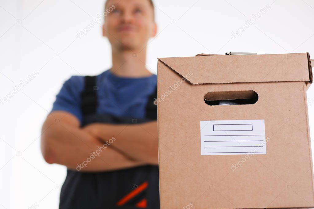 Specialist courier delivery service carries boxes with parcels