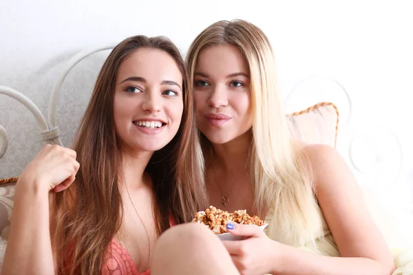 Portrait of two beautiful young smiling female — Stock Photo, Image