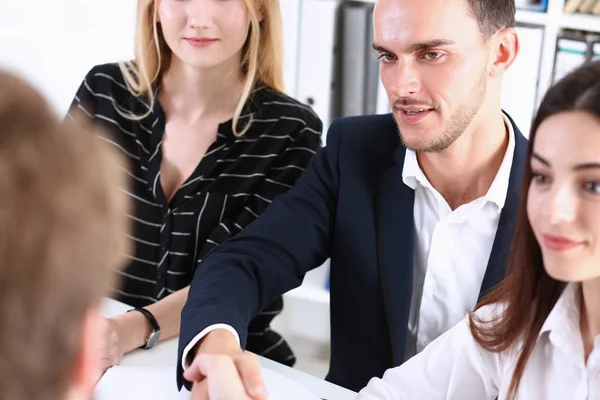 Smiling man in suit shake hands as hello — Stock Photo, Image