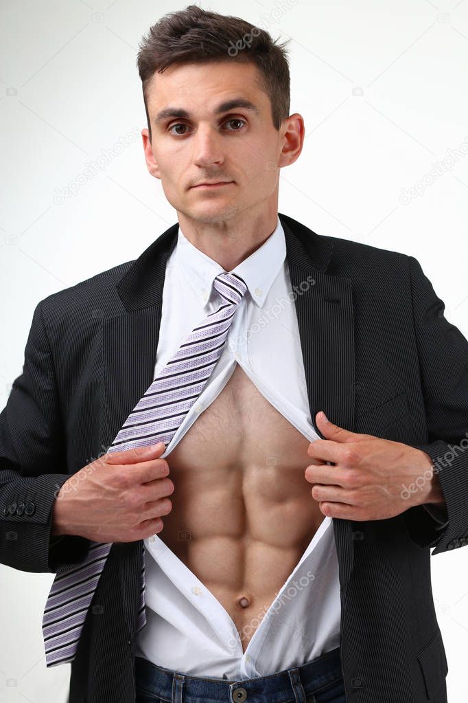 man in tie rip clothes off torso showing abs