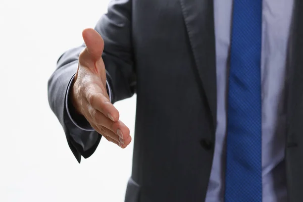 Mannen i kostym och slips ge hand som hello — Stockfoto