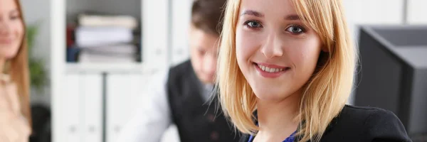 Beautiful smiling cheerful girl at workplace — Stock Photo, Image