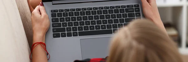 Young woman hold laptop in arms work — Stock Photo, Image