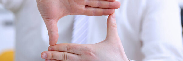 Male arms articulating during conference