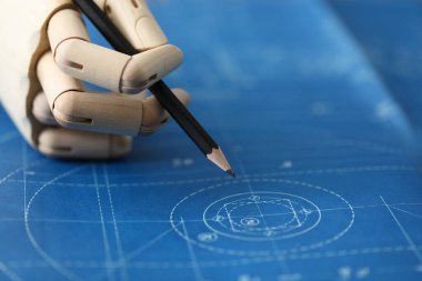 Tahta el, planlara karşı siyah kalemi tut.