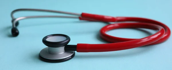 Red doctor stethoscope on blue modern background — Stock Photo, Image