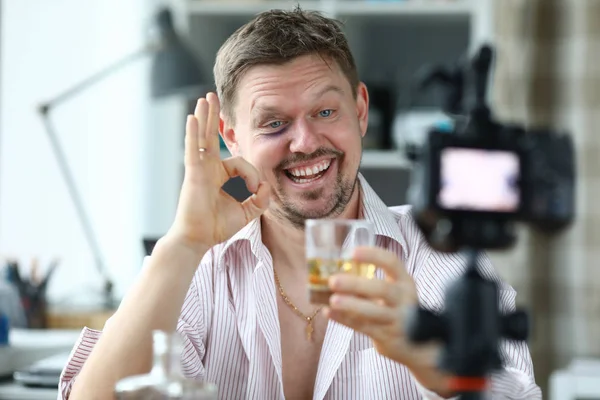 Drunk male director holds a glass with whiskey — 스톡 사진