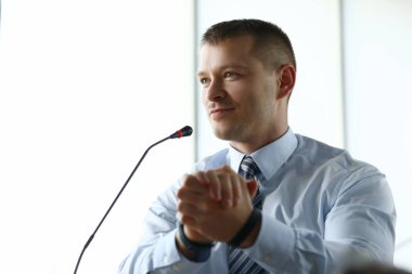 Male businessman implements progress report for year portrait.