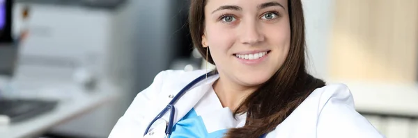 Beautiful physician at workplace — Stock Photo, Image