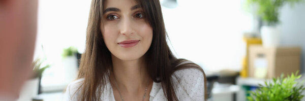 Smiling designer discussing color of designing project