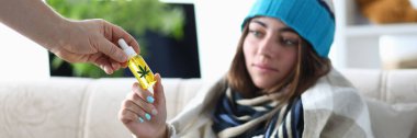 Unhealthy woman using cbd oil