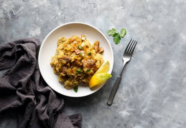 Fufu de platano verde maduro, tacaho, Mofongo, domuz eti ve soğanla haşlanmış muz püresi. Porto Riko. Amazon mutfağı, Peru, Küba