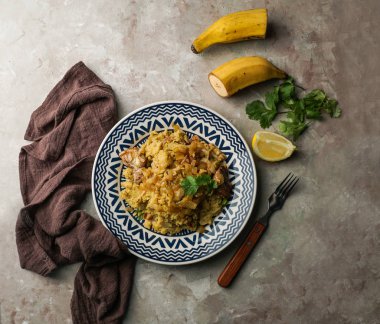 Fufu de platano verde maduro, tacaho, Mofongo, domuz eti ve soğanla haşlanmış muz püresi. Porto Riko. Amazon mutfağı, Peru, Küba