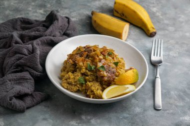 Fufu de platano verde maduro, tacaho, Mofongo, domuz eti ve soğanla haşlanmış muz püresi. Porto Riko. Amazon mutfağı, Peru, Küba