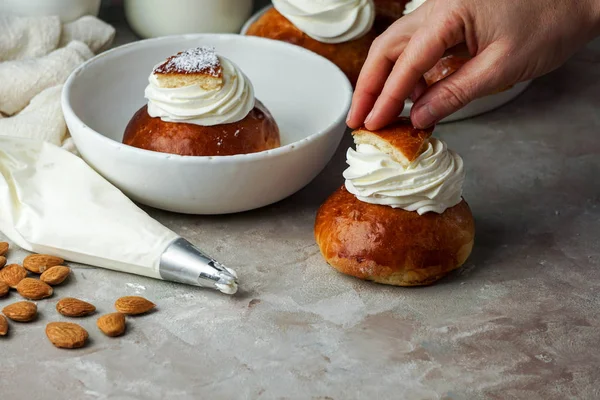 Semla or semlor, vastlakukkel, laskiaispulla is a traditional sweet roll made in various forms in Sweden, Finland, Estonia, Norway, Denmark, especially Shrove Monday and Shrove Tuesday