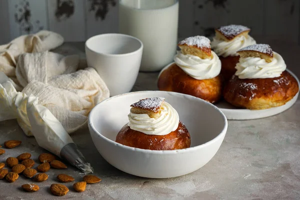 Semla or semlor, vastlakukkel, laskiaispulla is a traditional sweet roll made in various forms in Sweden, Finland, Estonia, Norway, Denmark, especially Shrove Monday and Shrove Tuesday