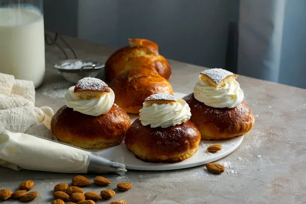 Semla or semlor, vastlakukkel, laskiaispulla is a traditional sweet roll made in various forms in Sweden, Finland, Estonia, Norway, Denmark, especially Shrove Monday and Shrove Tuesday