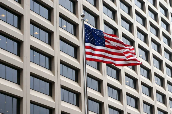 American Flag in front of Office Building in New York