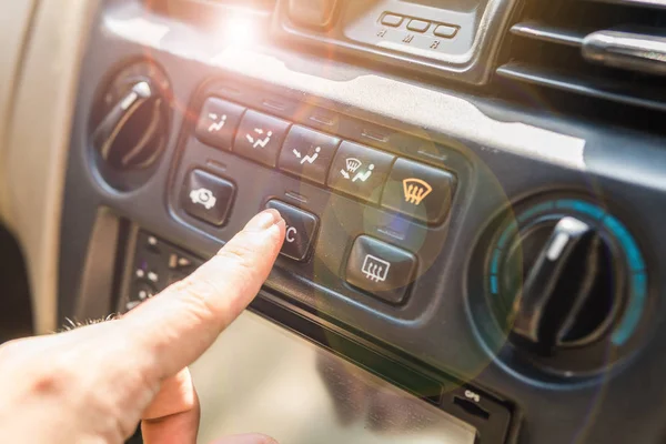 Press the control panel for the air inside the car. — Stock Photo, Image