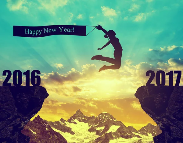 Girl jumps to the New Year 2017 — Stock Photo, Image