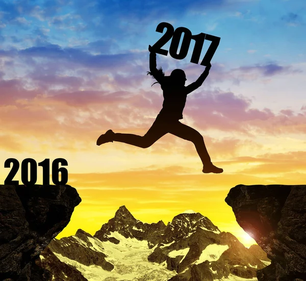 Girl jumps to the New Year 2017 — Stock Photo, Image