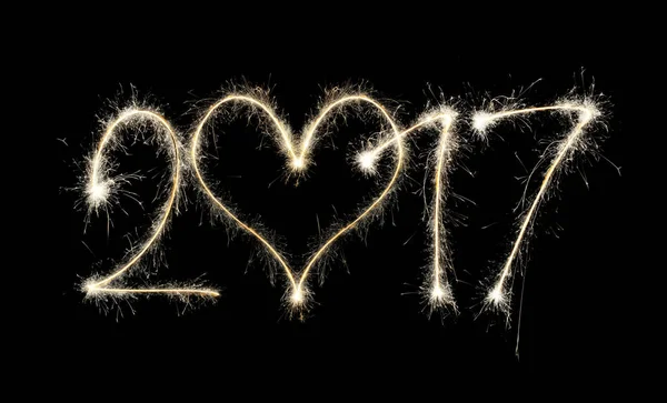 2017 writen with sparklers on black background — Stock Photo, Image
