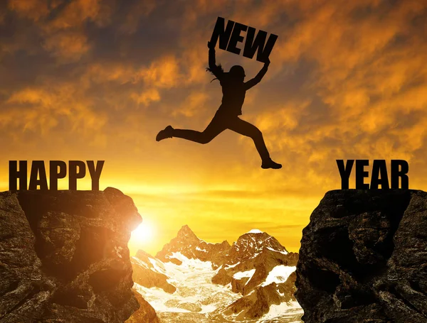 Silhouette tjej hoppar på det nya året — Stockfoto