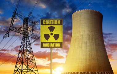 Radyoaktivite uyarı simgesi ve elektrik pilon ile nükleer enerji santrali