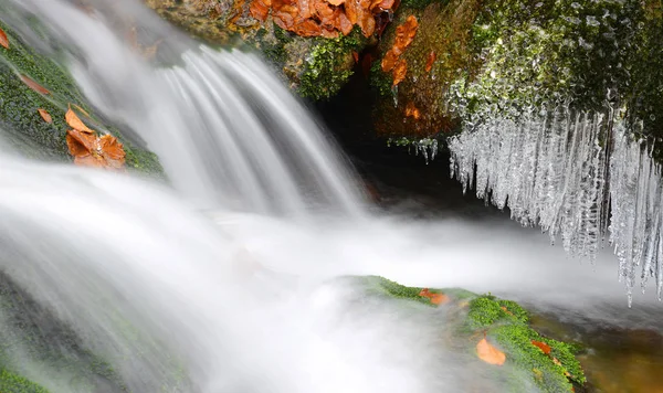 Winter creek with icicles — Stock Photo, Image