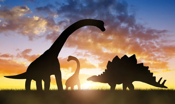 Dinosaures au coucher du soleil . — Photo