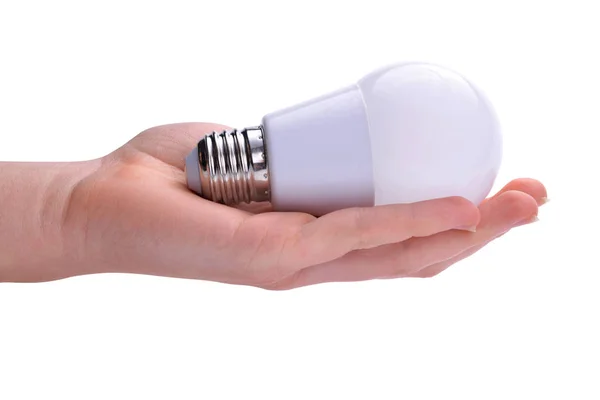 LED-lampa i handen på vit bakgrund. — Stockfoto