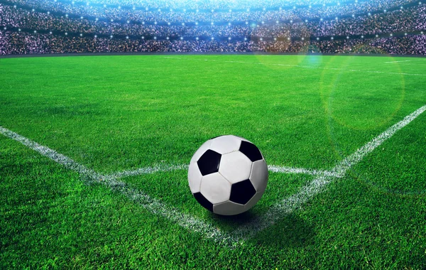 Soccer ball on grass in stadium. — Stock Photo, Image