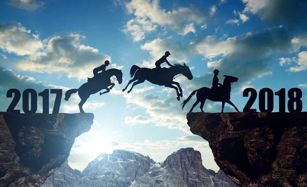 The riders on the horses jumping into the New Year 2018. — Stock Photo, Image