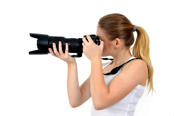 Young beautiful woman holding a photo camera. — Stock Photo, Image