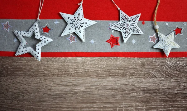 Noel dekorasyon ahşap tahta üzerinde masa örtüsü ile şekil Star.