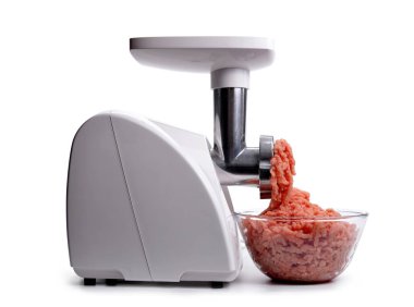 Electric meat grinder and bowl with minced meat isolated on a white background. clipart