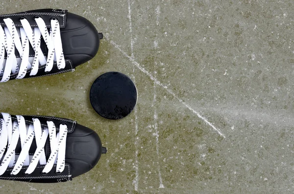 Pair Hockey Skates Puck Ice Rink — Stock Photo, Image