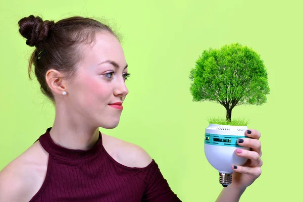 Girl Holding Eco Light Bulb Tree Hand Green Energy Concept — Stock Photo, Image