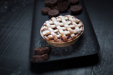 American Pie kurabiye ile. Siyah bir plaka üzerinde