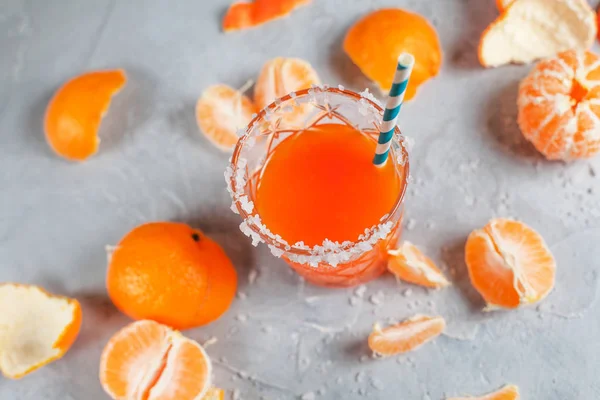 Orange cocktails, salt and tangerines on a light background — Stock Photo, Image