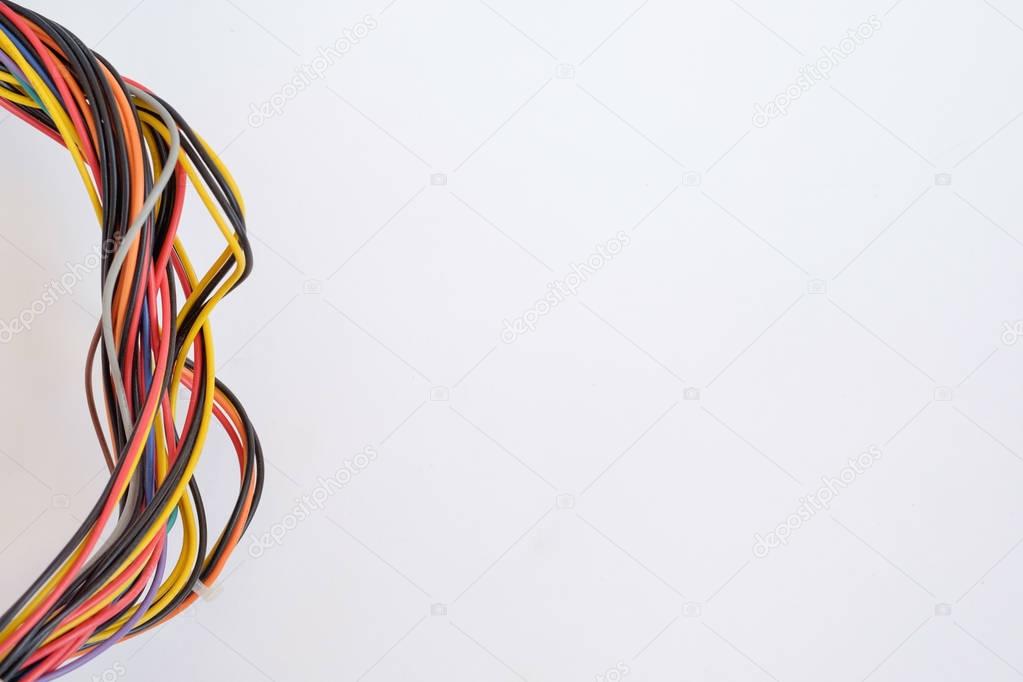 Close-up of colorful electrical cables. Isolated on white, copy space