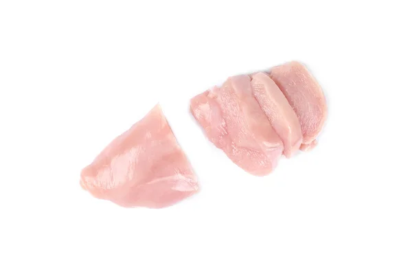 Uncooked chicken fillet and slices of chicken fillet isolated on white. — 图库照片