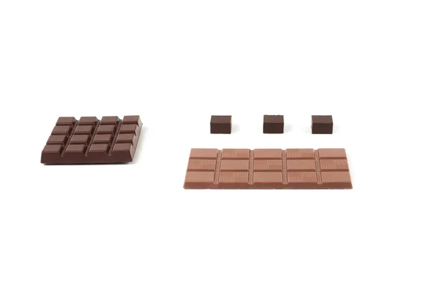 Verschiedene Arten von Schokolade auf weißem Hintergrund. — Stockfoto