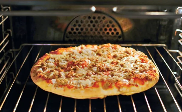 Pizza Inside Oven Stock Photo