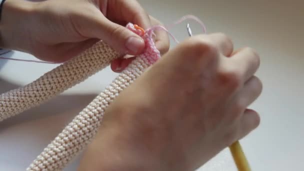 Womans hands while Doll making — Stock Video