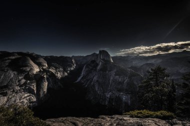 Yosemite Valley on a moonlit night clipart