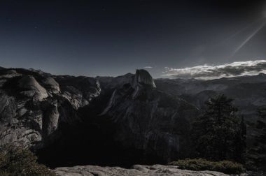 Yosemite Valley on a moonlit night clipart