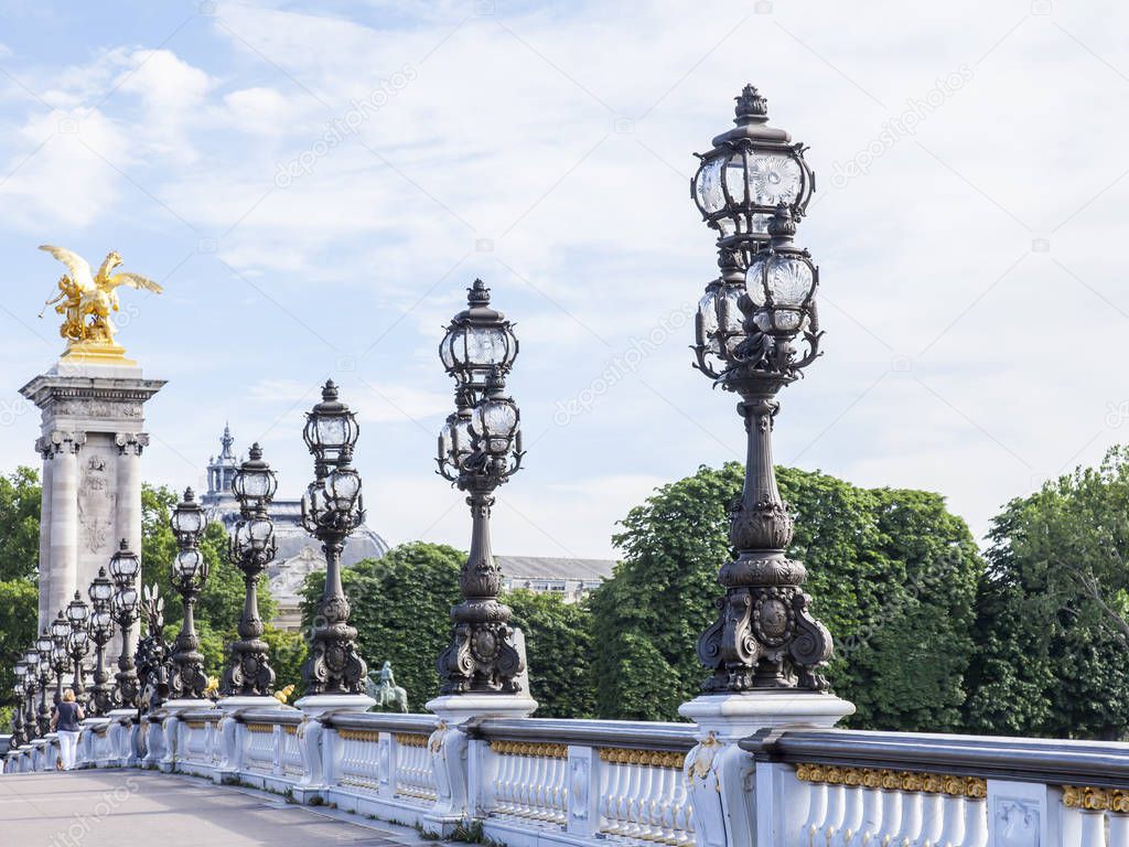 PARIS, FRANCE, on JULY 10, 2016. Architectural details of a decor of Alexander III Bridge. Beautiful streetlight